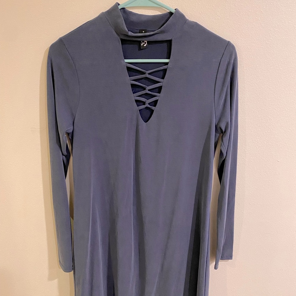 Long sleeve dress with cut out neck detail. Size medium.